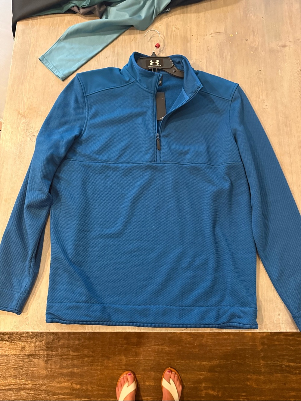 Under Armour Storm Blue Quarter-Zip golf pullover